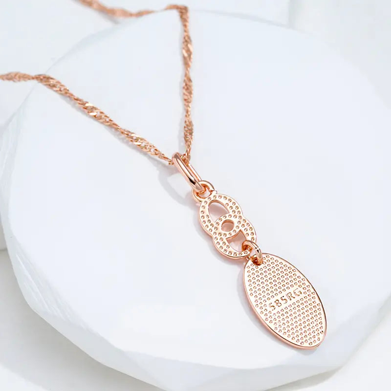 Golden Necklace with a Shiny Tip